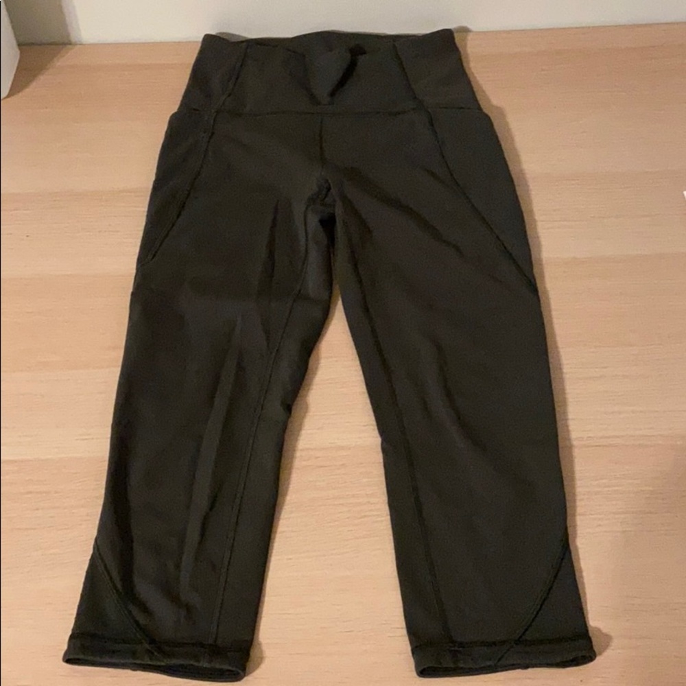 Cropped army green Lululemon leggings